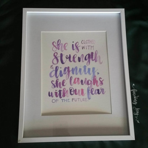 Brush Lettering Art | Proverbs 31:25 "She is clothed with strength and dignity, she laughs without fear of the future." | by @joyadanwrites | Inspiring quotes to empower girls | Christian