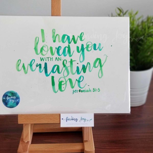 Original, hand-painted brush-lettered artwork of quote "I have loved you with an everlasting love" - Jeremiah 31:3 written in different shades of green and turquoise watercolour ink on A4 300GSM card. written in watercolour on A4 card. © Joy Adan 2018