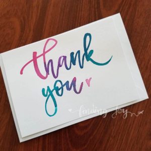 Hand-made 'thank you' card - brush lettering in fuschia Ecoline and calligraphy ink. Each card is painted on matte card stock. Inside: blank. © Joy Adan 2018